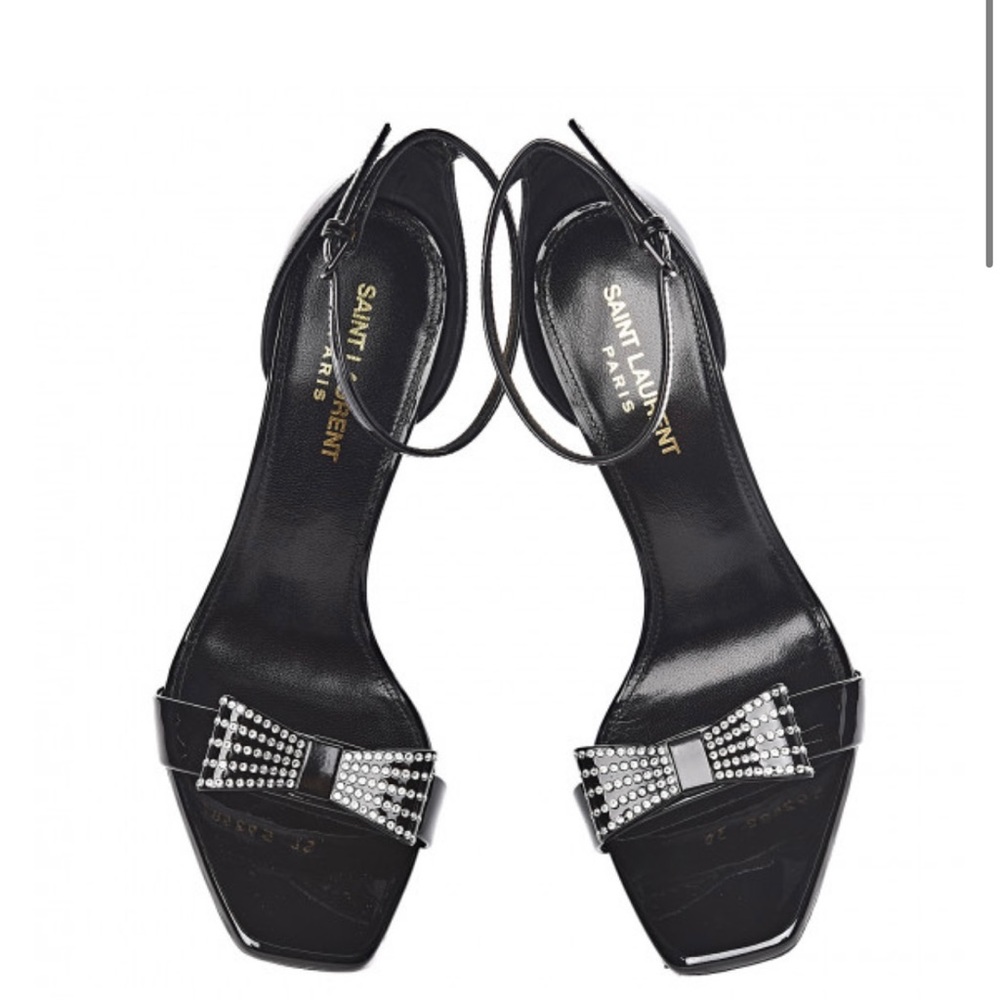SAINT LAURENT
Patent Calfskin Crystal Amber Bow 85 Ankle Strap Sandals 41 Black - Picture 2 of 5